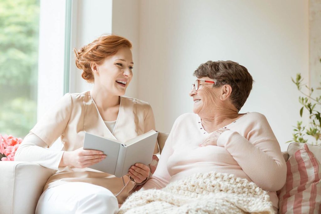 LOLOMA carer sharing a warm moment with a participant